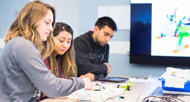 UC Merced students working in a lab.