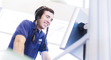 Student looking online for information on Summer Session.