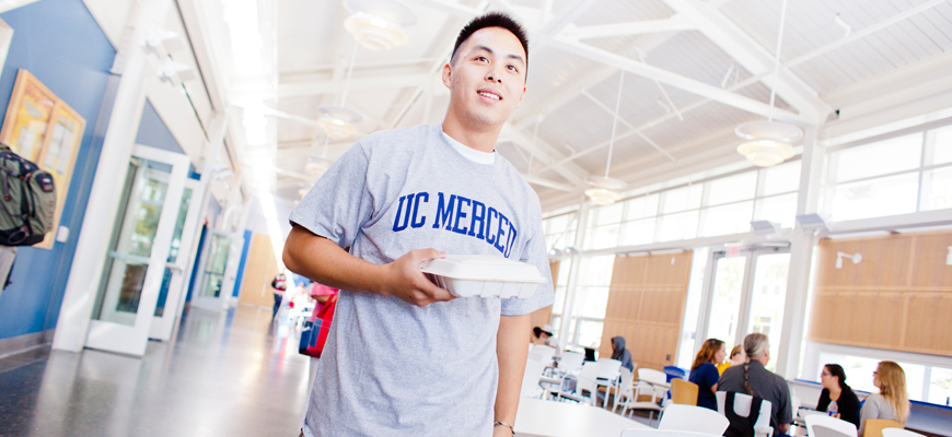 UC Merced student in dining hall